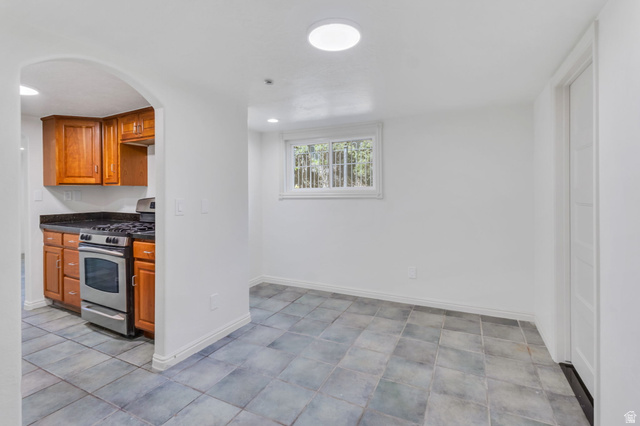 226 North 300 West Provo, UT 84601 - Photo 12 of 14 Room featuring slate-look floor tiles and bright white walls