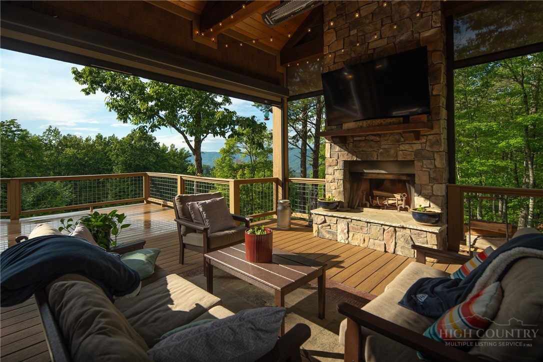 115 Passionflower Trail Boone, NC 28607 - Photo 12 of 50 a view of a couches in a patio
