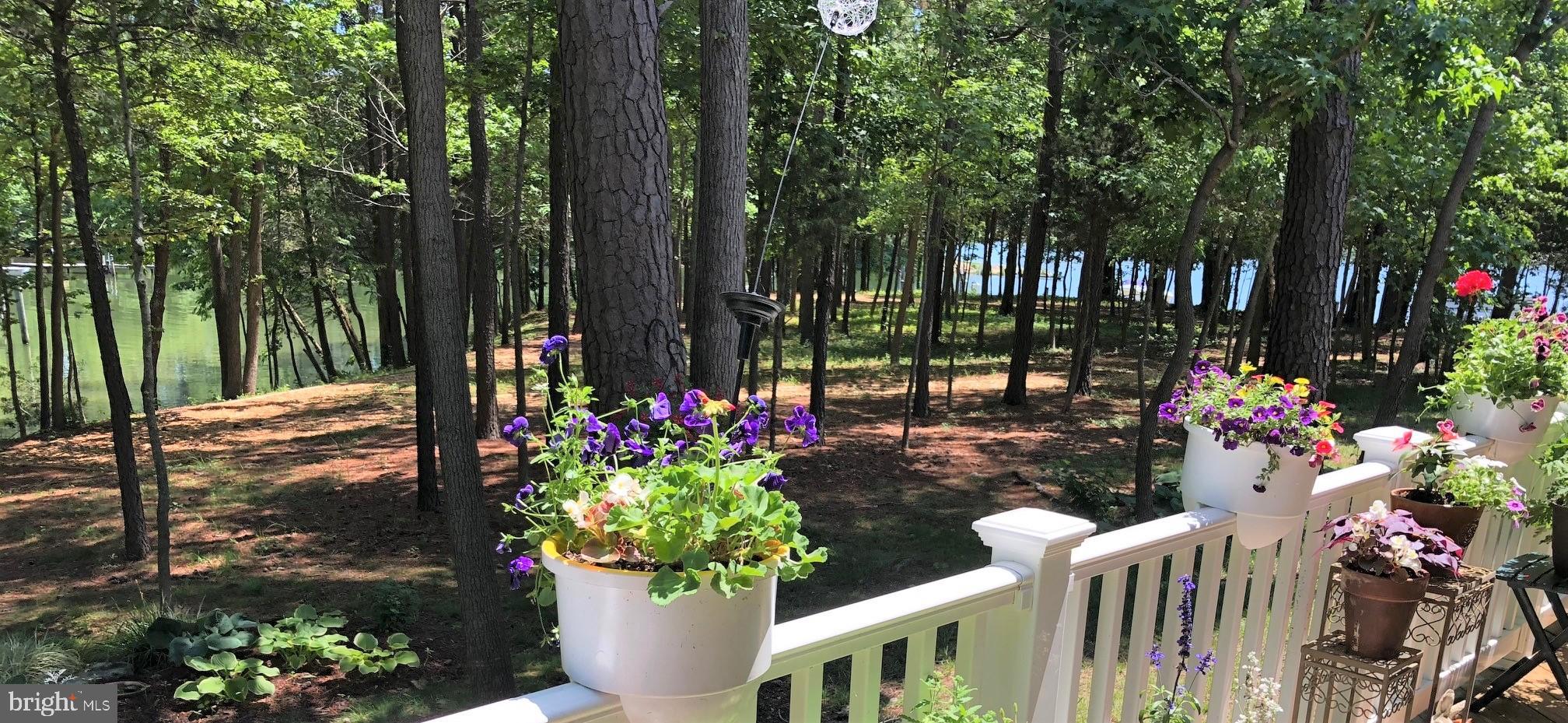 Beautiful water view  from deck with railing
