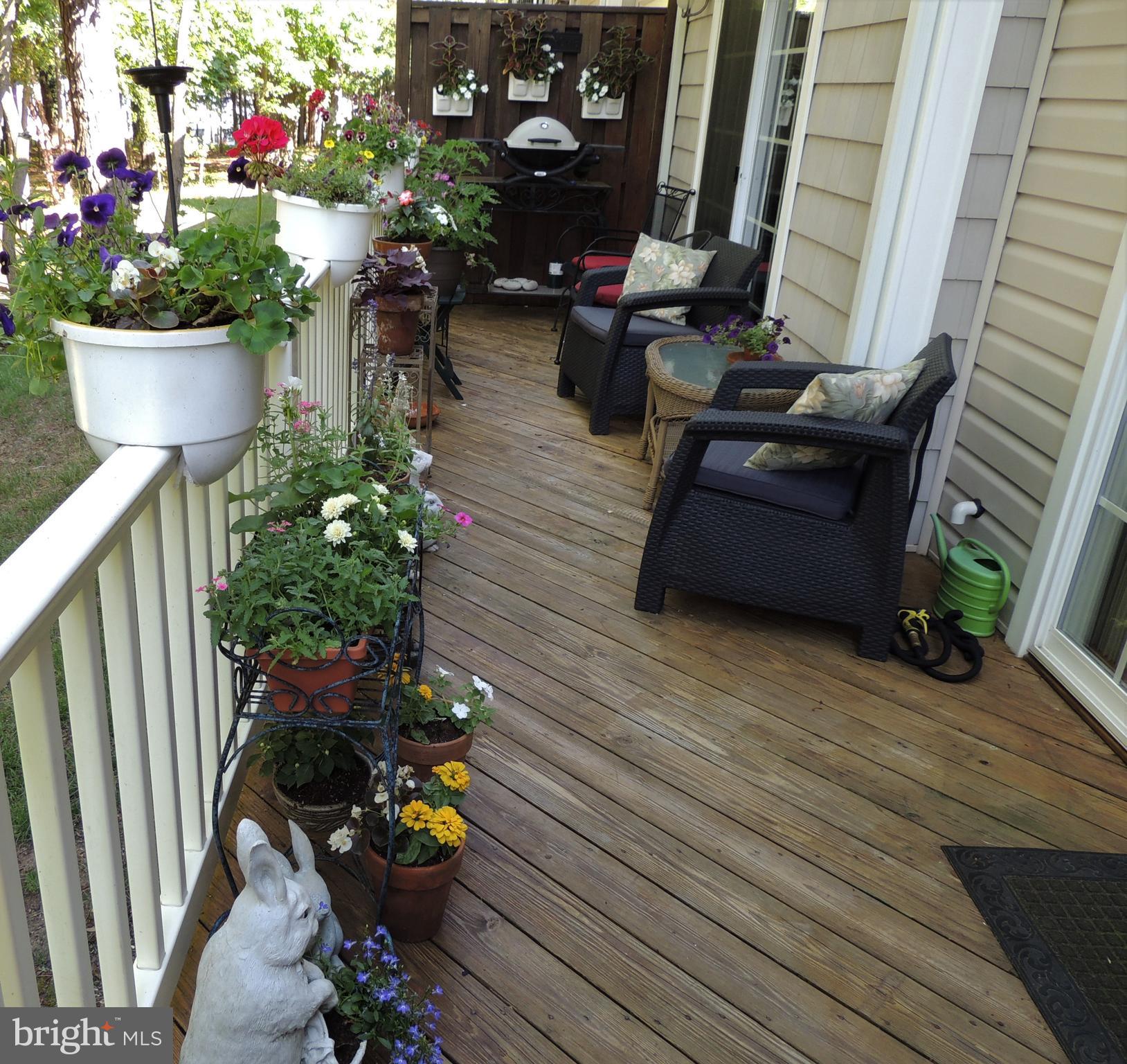 14174 Foxhall Road, Unit 12 Dowell, MD 20629 - Photo 30 of 40 Spacious deck overlooking water-attractive railing