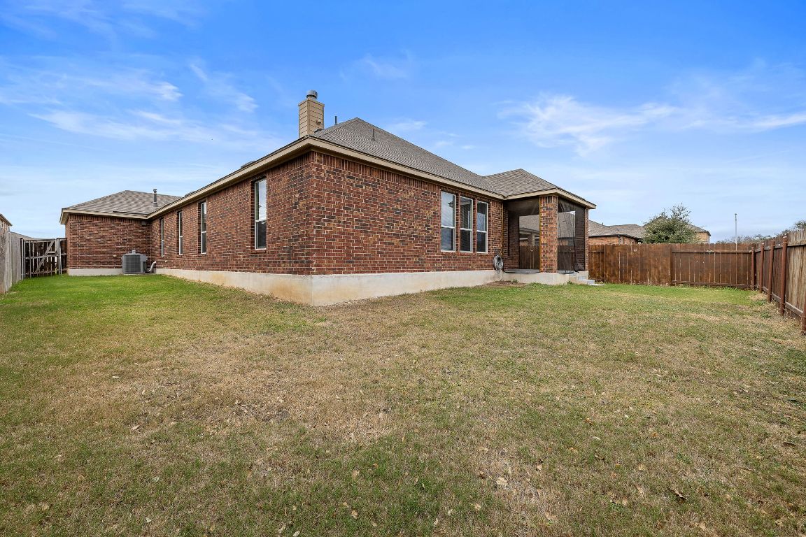 1012 Plano Lane Leander, TX 78641 - Photo 21 of 21 a view of a house with a yard