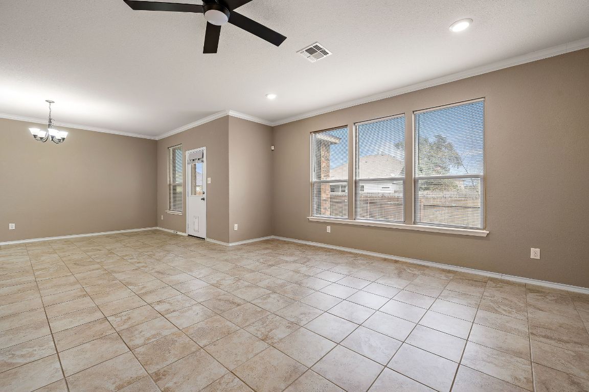 1012 Plano Lane Leander, TX 78641 - Photo 6 of 21 a view of an empty room with a window