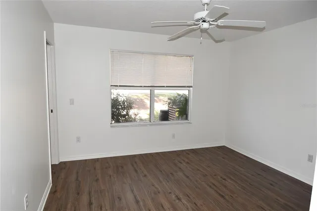 a bathroom with a shower sink and mirror