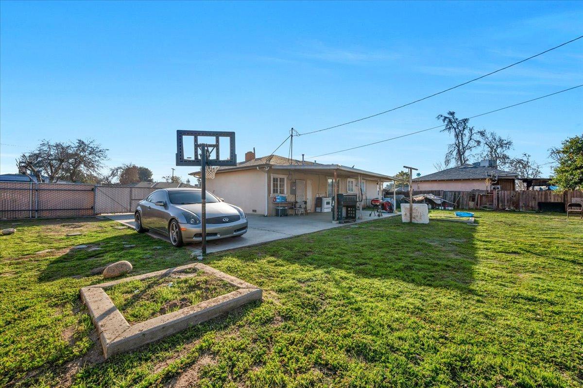 4185 East Turner Avenue Fresno, CA 93702 - Photo 25 of 39 a house view with a garden space