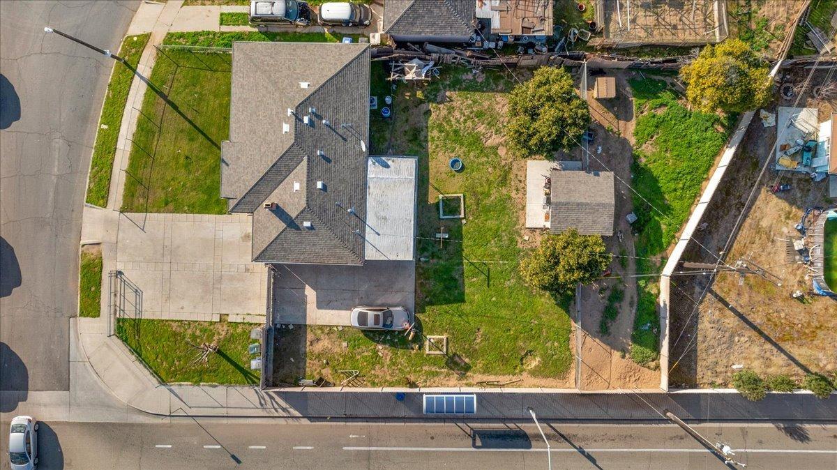 4185 East Turner Avenue Fresno, CA 93702 - Photo 5 of 39 an aerial view of a residential houses with yard