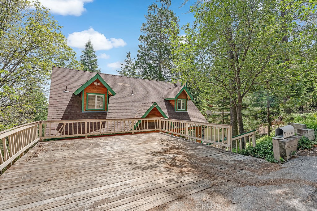 318 Old Toll Road Lake Arrowhead, CA 92352 - Photo 5 of 44 a view of house with yard and sitting area