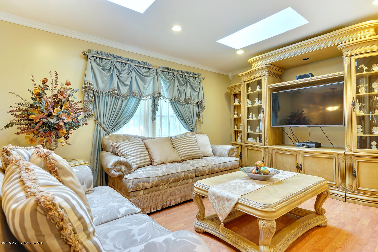 6 Hickory Hill Road Jackson, NJ 08527 - Photo 11 of 53 a living room with a couch and a flat screen tv