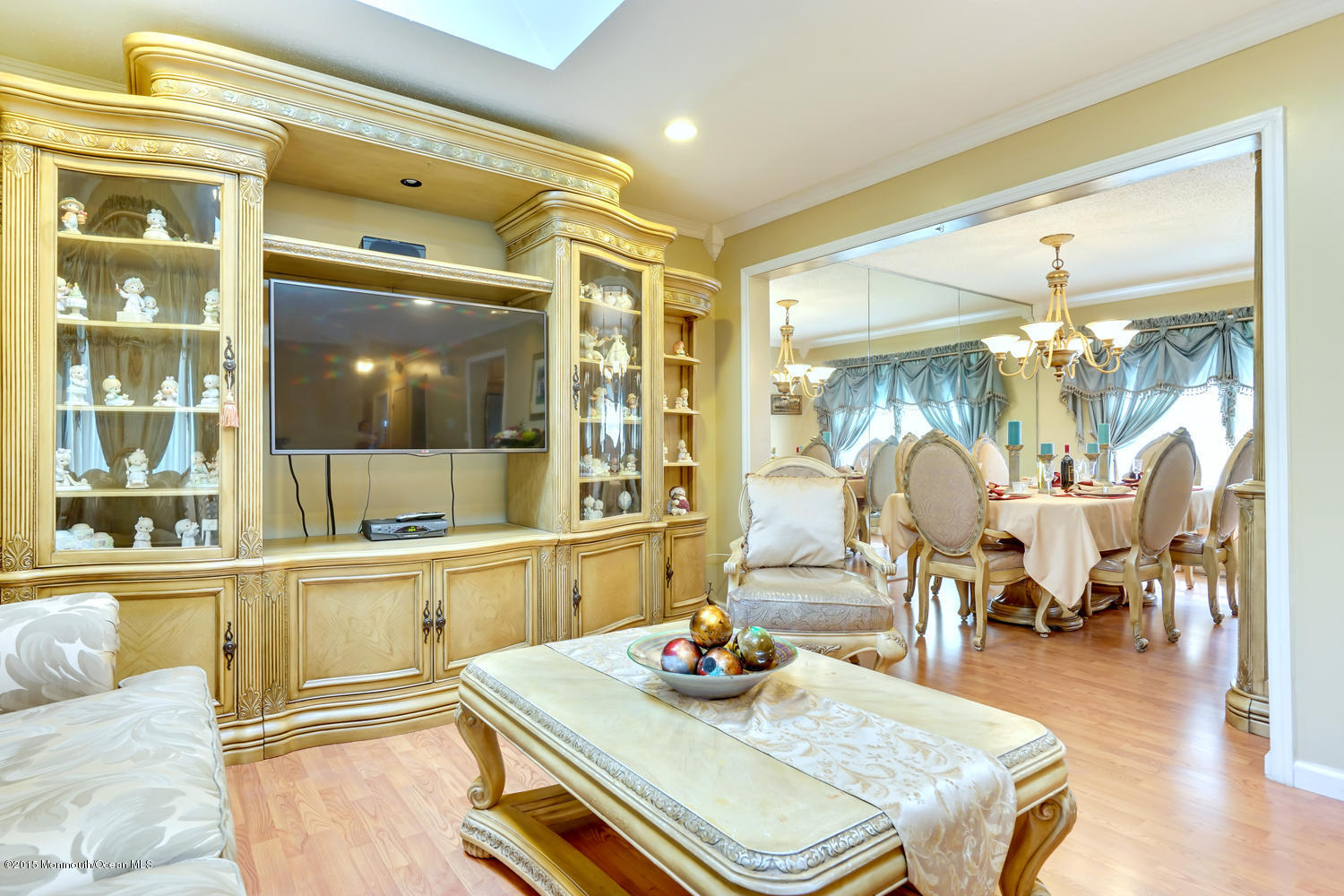 6 Hickory Hill Road Jackson, NJ 08527 - Photo 13 of 53 a living room with furniture and a chandelier
