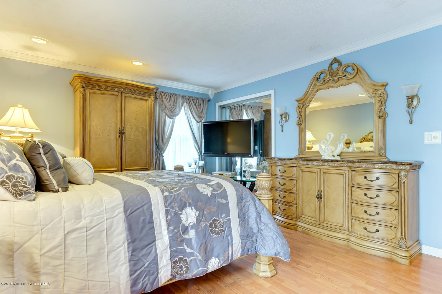 6 Hickory Hill Road Jackson, NJ 08527 - Photo 31 of 53 a bedroom with a bed and a mirror on dresser