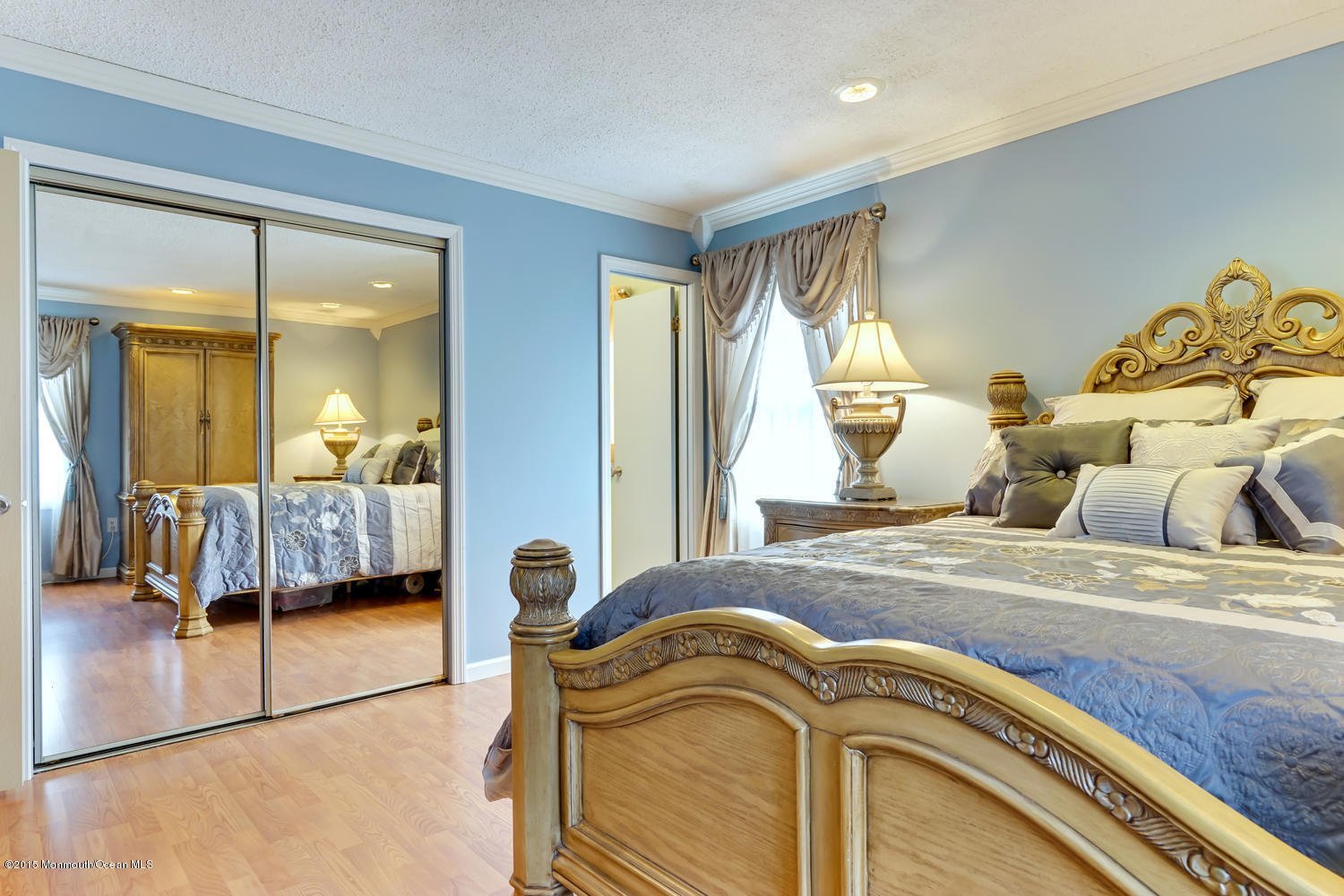 6 Hickory Hill Road Jackson, NJ 08527 - Photo 33 of 53 a bedroom with a bed and a large mirror