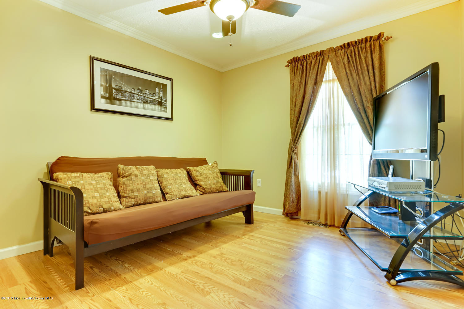 6 Hickory Hill Road Jackson, NJ 08527 - Photo 35 of 53 a living room with furniture and a flat screen tv