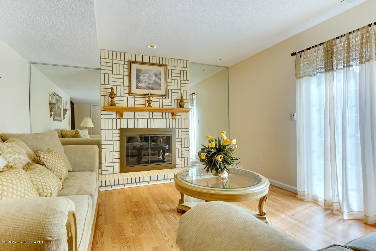 6 Hickory Hill Road Jackson, NJ 08527 - Photo 39 of 53 a living room with furniture and a fireplace