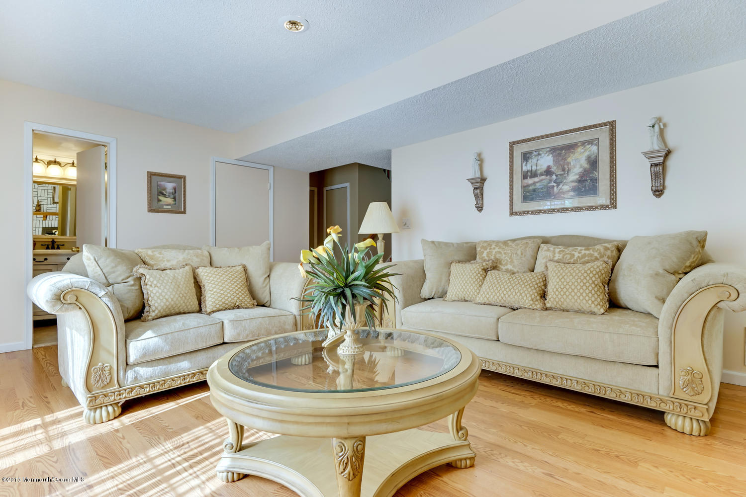 6 Hickory Hill Road Jackson, NJ 08527 - Photo 42 of 53 a living room with furniture and a dining table with wooden floor