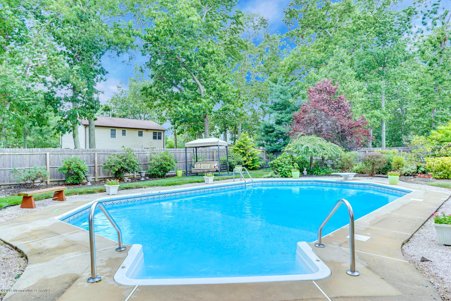6 Hickory Hill Road Jackson, NJ 08527 - Photo 46 of 53 a swimming pool with outdoor seating and yard