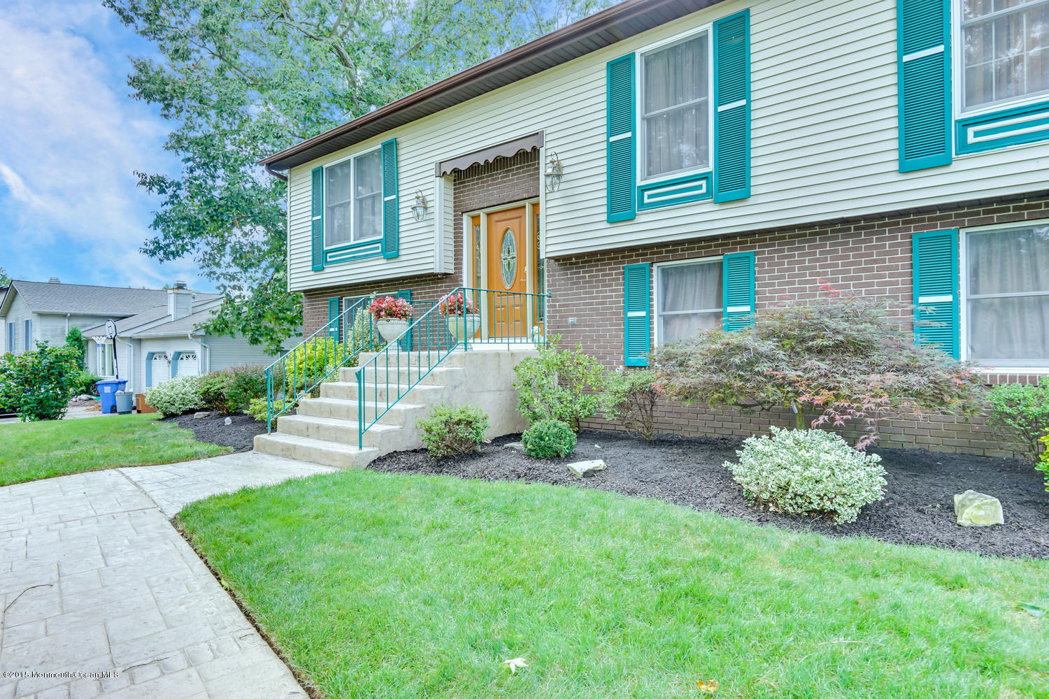 6 Hickory Hill Road Jackson, NJ 08527 - Photo 6 of 53 a front view of a house with garden