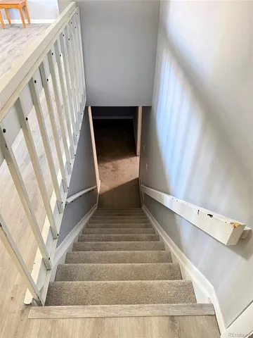 a view of a livingroom with furniture
