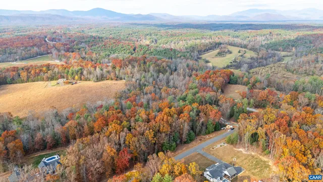a view of a city with mountains in the background