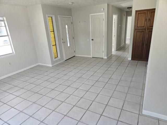217 Griffith Drive Rockport, TX 78382 - Photo 4 of 14 an empty room with windows
