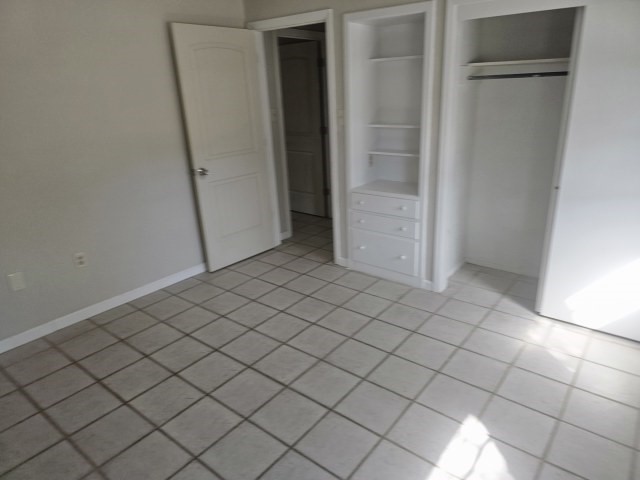217 Griffith Drive Rockport, TX 78382 - Photo 10 of 14 an empty room with white door