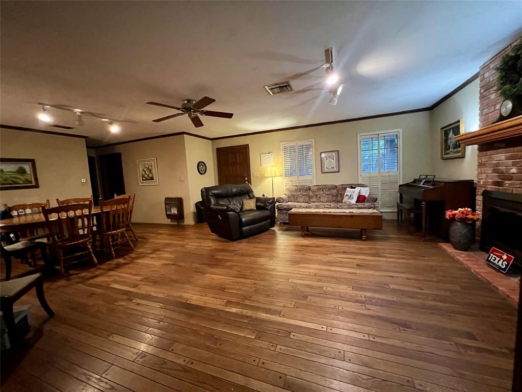 419 Limestone County Road 648, Unit LCR Thornton, TX 76687 - Photo 14 of 20 a living room with furniture and a flat screen tv