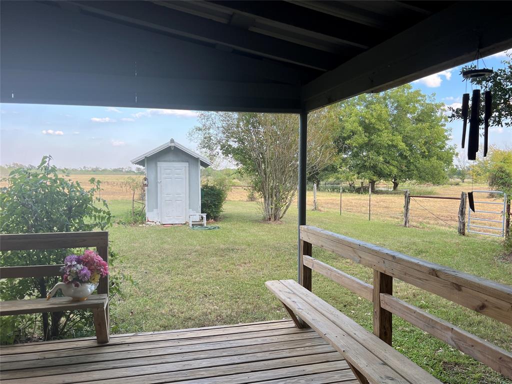 419 Limestone County Road 648, Unit LCR Thornton, TX 76687 - Photo 17 of 20 a view of a porch with furniture and garden