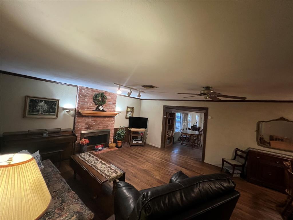 419 Limestone County Road 648, Unit LCR Thornton, TX 76687 - Photo 9 of 20 a living room with furniture and a fireplace