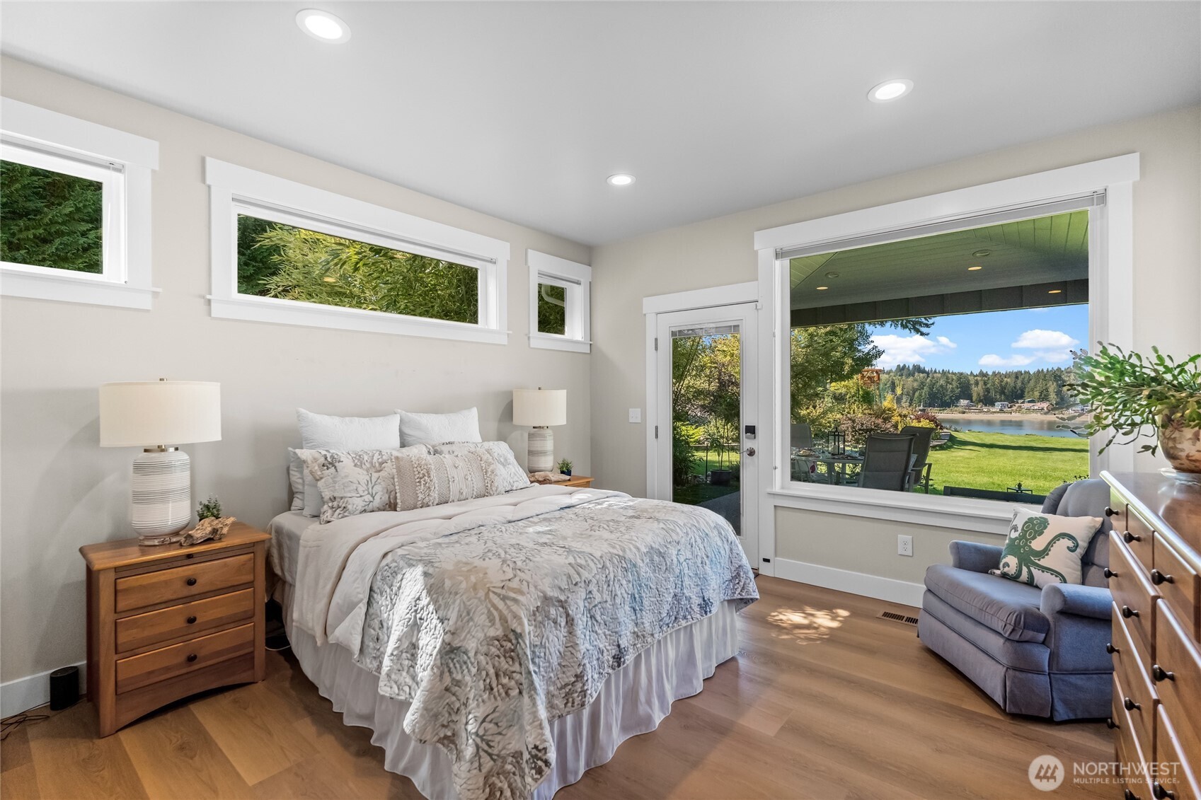 460 East Stretch Island Road South Grapeview, WA 98546 - Photo 14 of 39 a bed room with a bed and a couch