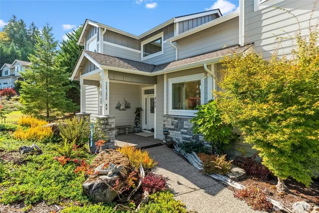 a view of a chair and tables in the patio