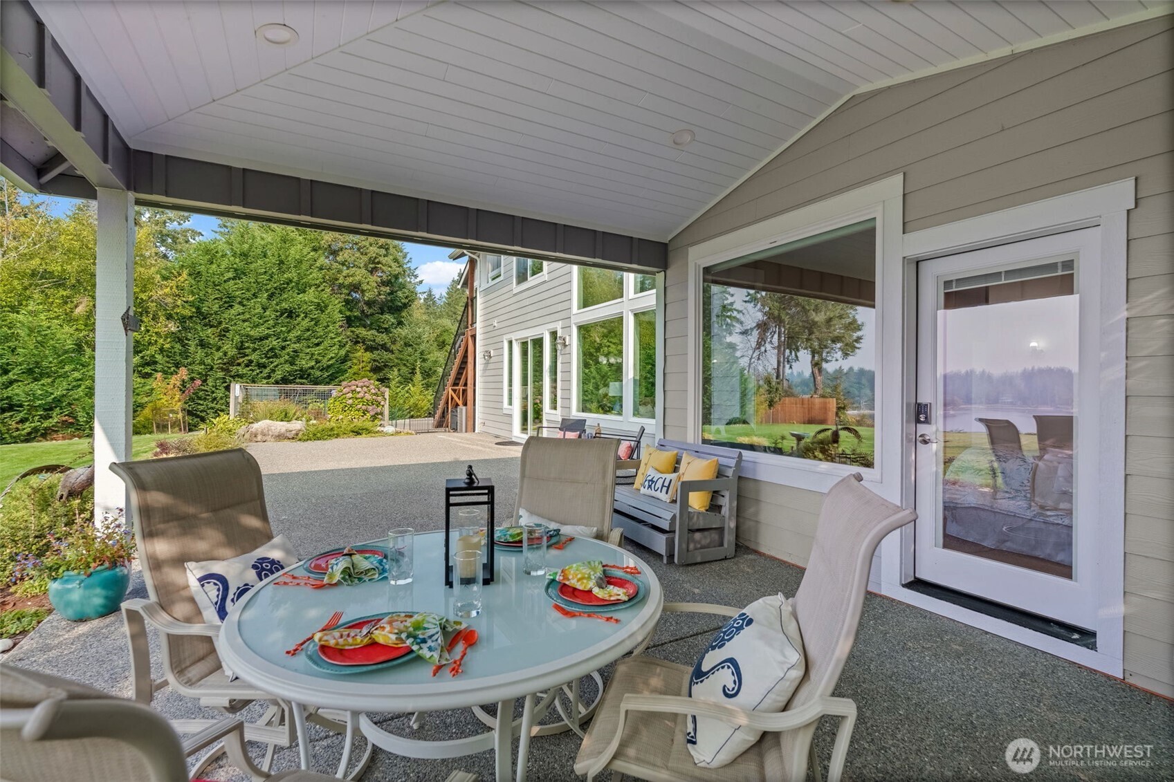 460 East Stretch Island Road South Grapeview, WA 98546 - Photo 21 of 39 a outdoor dining space with furniture and garden view