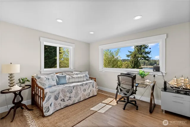 a bedroom with a bed and window