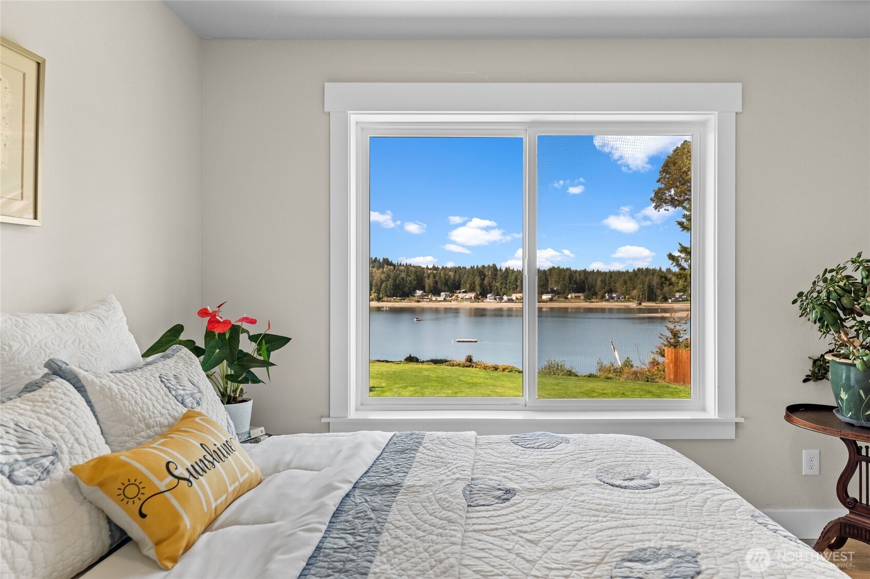 460 East Stretch Island Road South Grapeview, WA 98546 - Photo 23 of 39 a bedroom with a bed and window