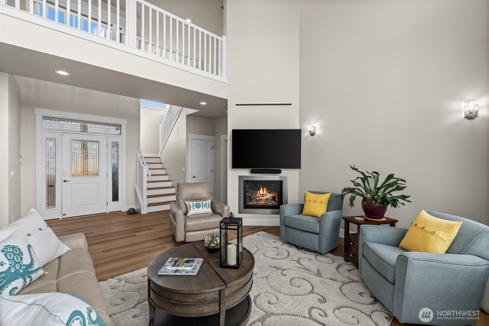 460 East Stretch Island Road South Grapeview, WA 98546 - Photo 6 of 39 a living room with furniture and a flat screen tv