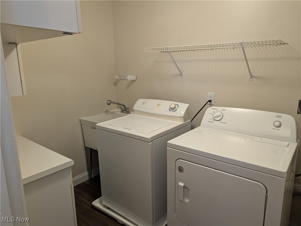 35286 Drake Street North Ridgeville, OH 44039 - Photo 11 of 24 Laundry room with dark wood-type flooring, washing machine and dryer, and sink
