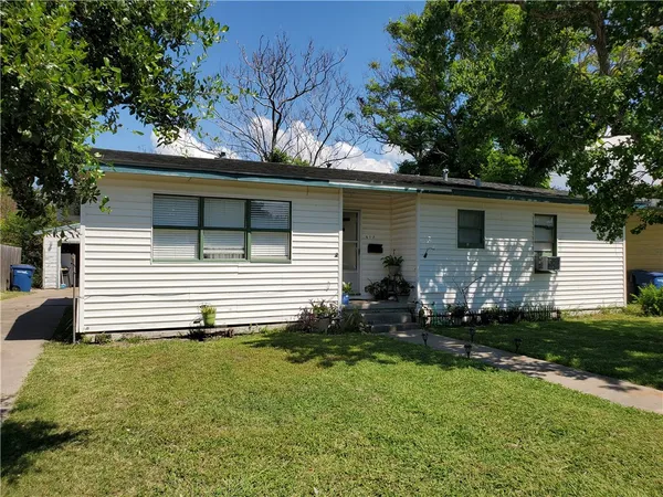 a front view of house with yard