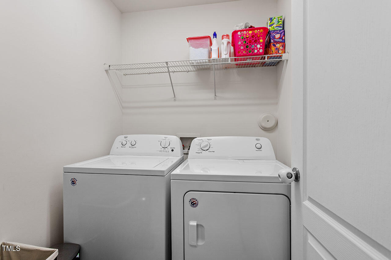 4817 Kitledge Drive Raleigh, NC 27610 - Photo 21 of 28 a utility room with dryer and washer