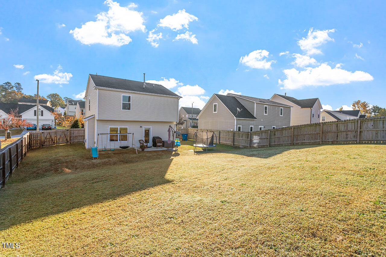 4817 Kitledge Drive Raleigh, NC 27610 - Photo 25 of 28 a swimming pool view with a outdoor space