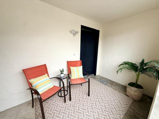 135 Bepler Street Daly City, CA 94014 - Photo 29 of 34 a living room with furniture and a potted plant