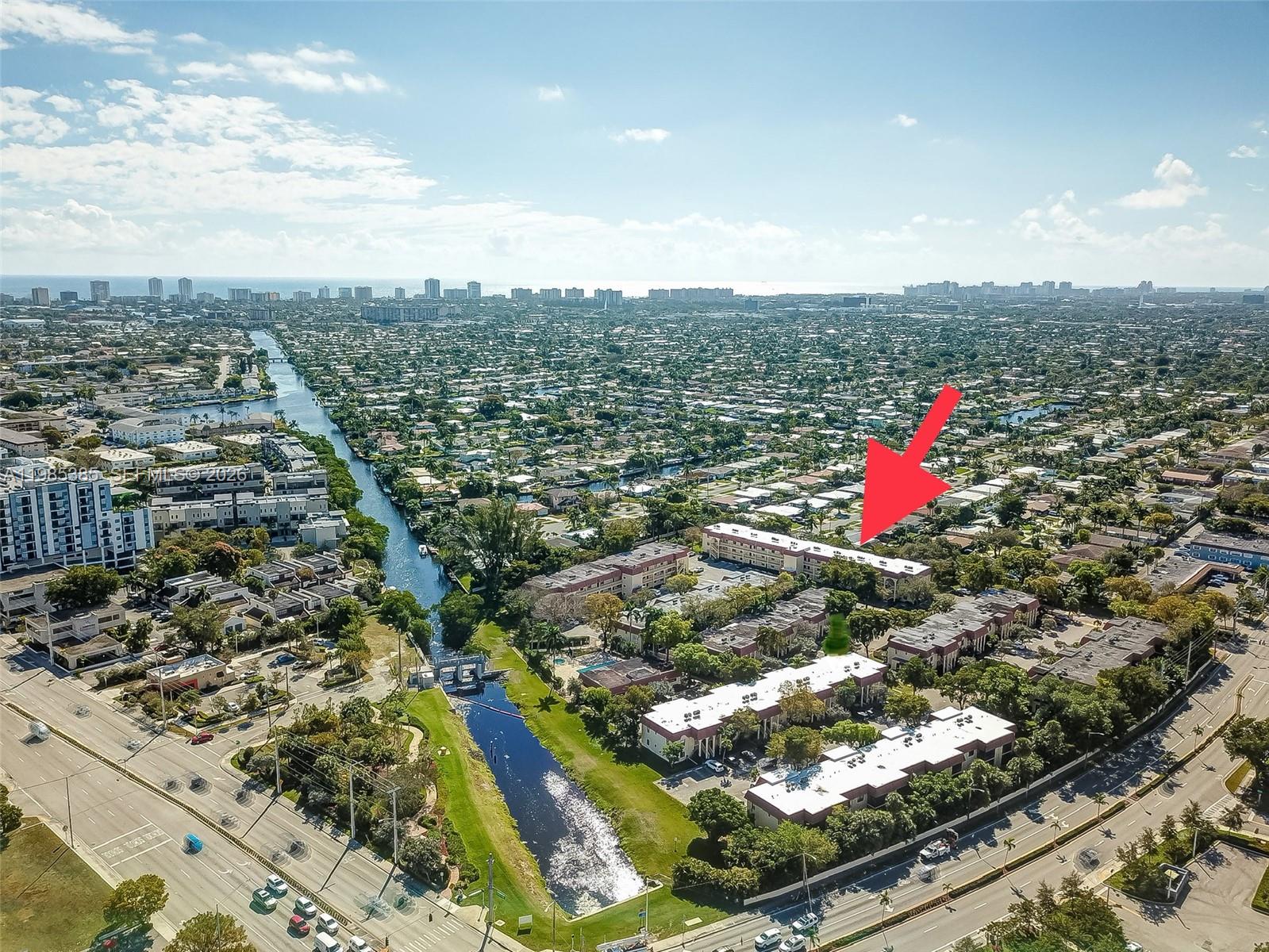 126 South Cypress Road, Unit 729 Pompano Beach, FL 33060 - Photo 24 of 26 an aerial view of residential houses with city view