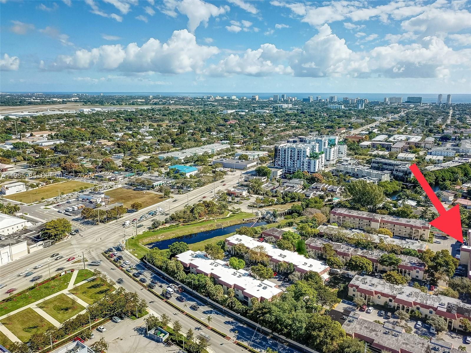 126 South Cypress Road, Unit 729 Pompano Beach, FL 33060 - Photo 25 of 26 an aerial view of residential houses with outdoor space