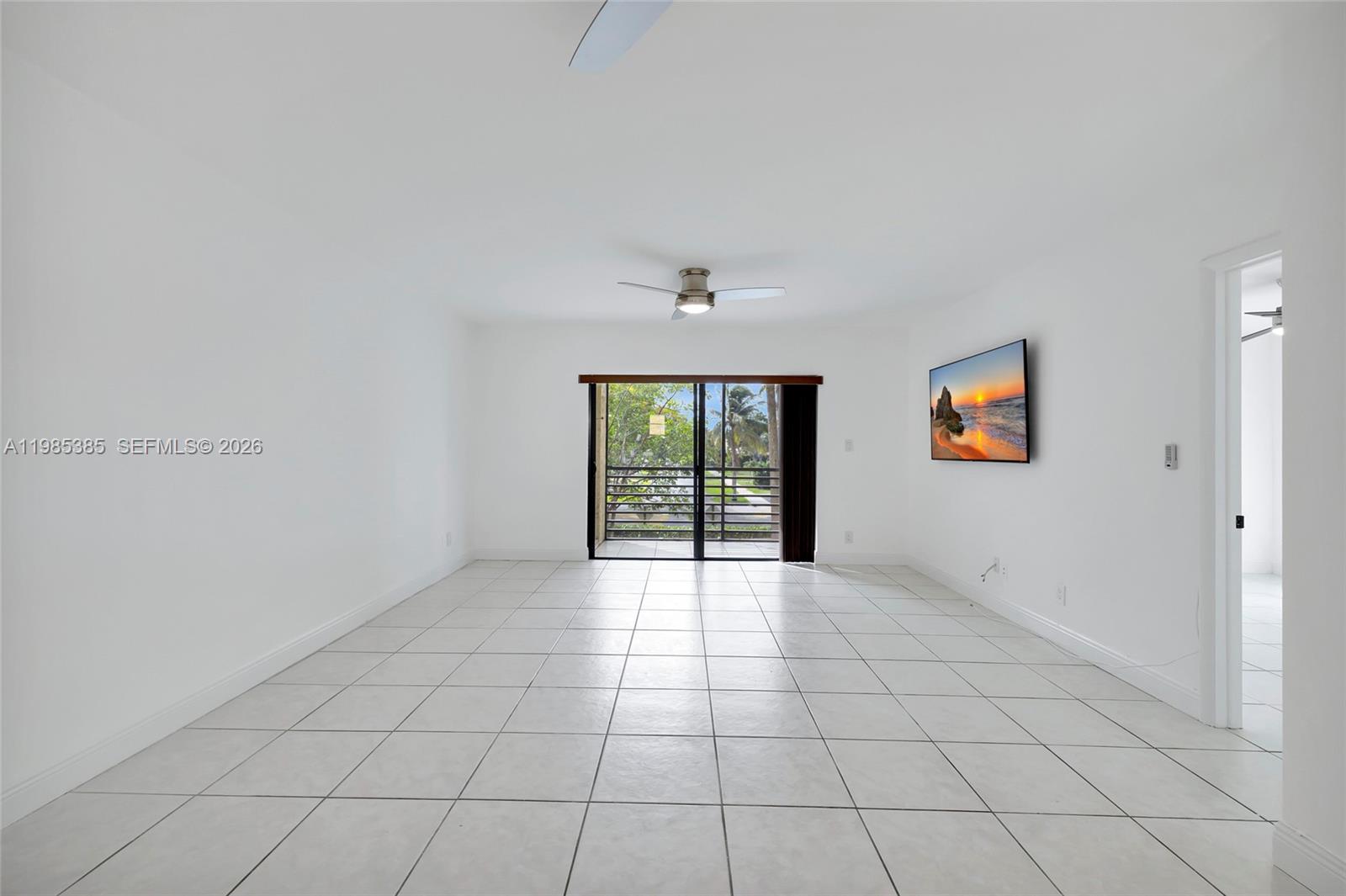 126 South Cypress Road, Unit 729 Pompano Beach, FL 33060 - Photo 9 of 26 a view of an empty room with a window