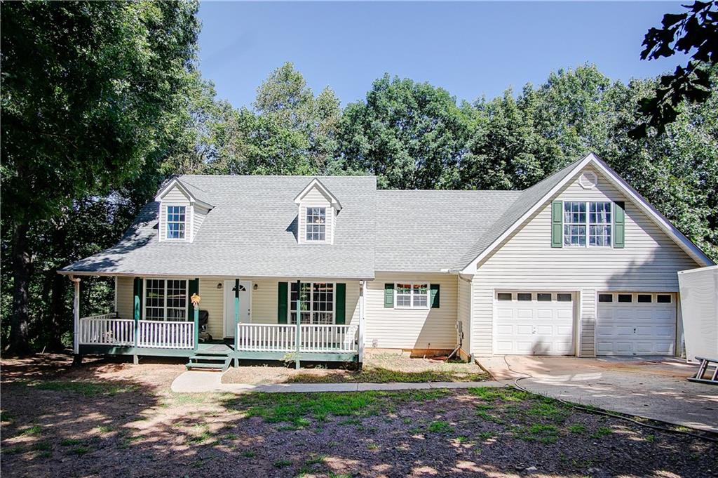 3128 Big Ridge Road Talking Rock, GA 30175 - Photo 1 of 1 a front view of a house with a yard