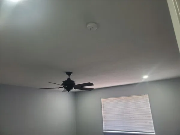 a view of empty room with projector