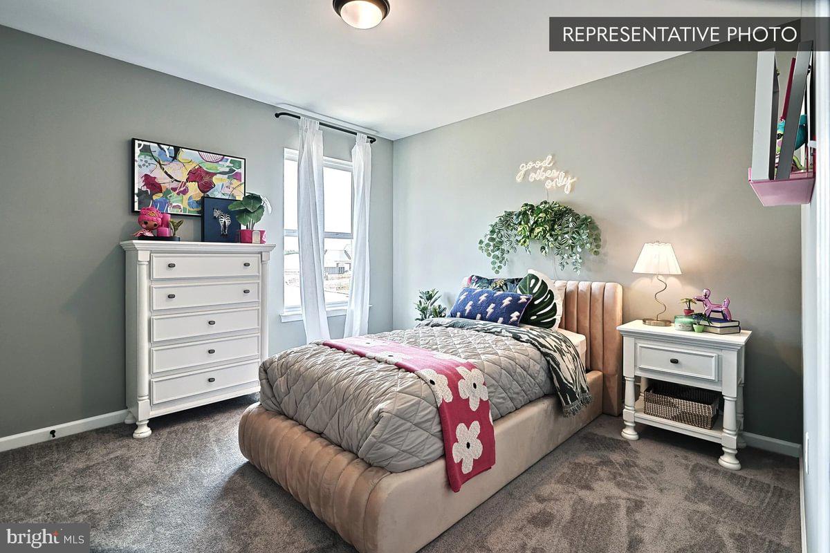 Sweet Birch Plan At Seiders Hill Pottsville, PA 17901 - Photo 12 of 15 a bedroom with a bed and a workspace