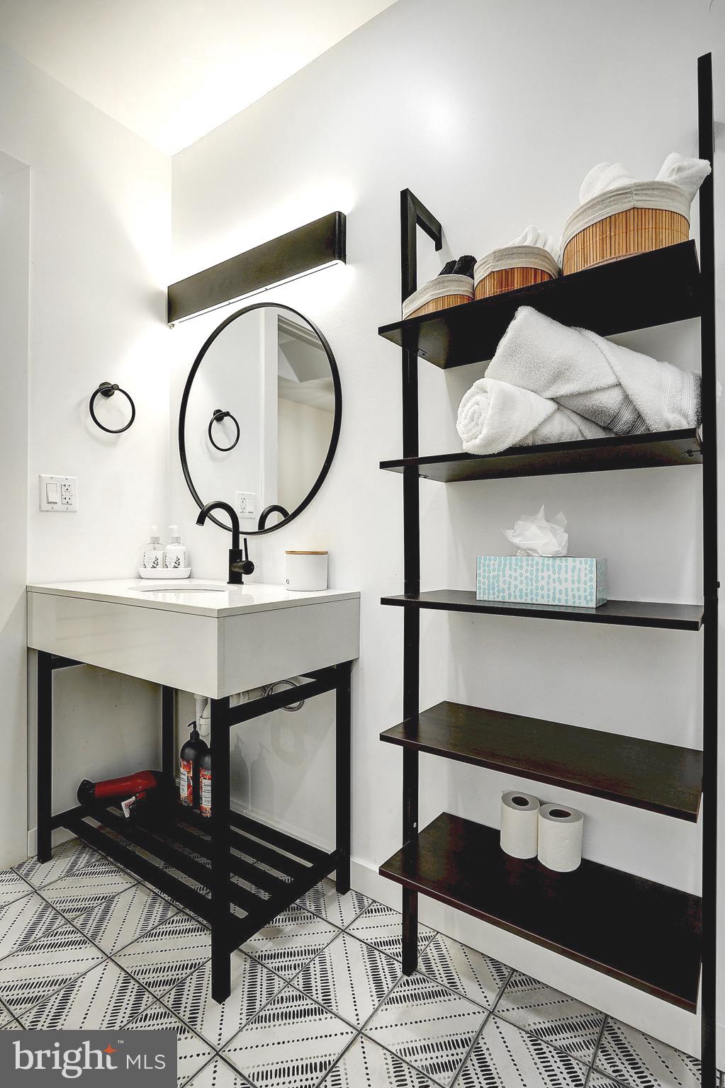 2203 Catharine Street Philadelphia, PA 19146 - Photo 20 of 27 a living room with furniture and a mirror