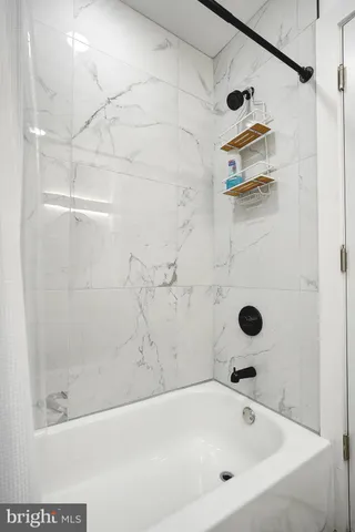 a bathroom with a bathtub