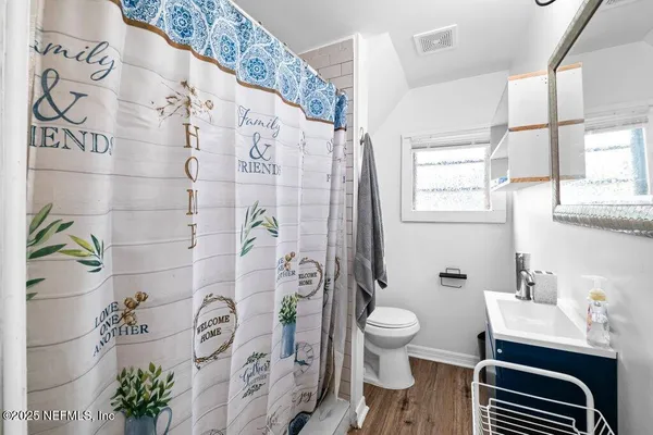 a bathroom with a sink and toilet