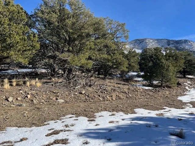 a view of a lake with mountain