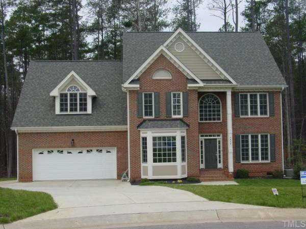 7925 Pine Timber Drive Raleigh, NC 27613 - Photo 1 of 1 Stunning Brick-front Executive Home with a private backyard in the Leesville School District. Hardwoods on first level, upgraded Berber on the second, and ceramic tiled baths/laundry. Exterior Front