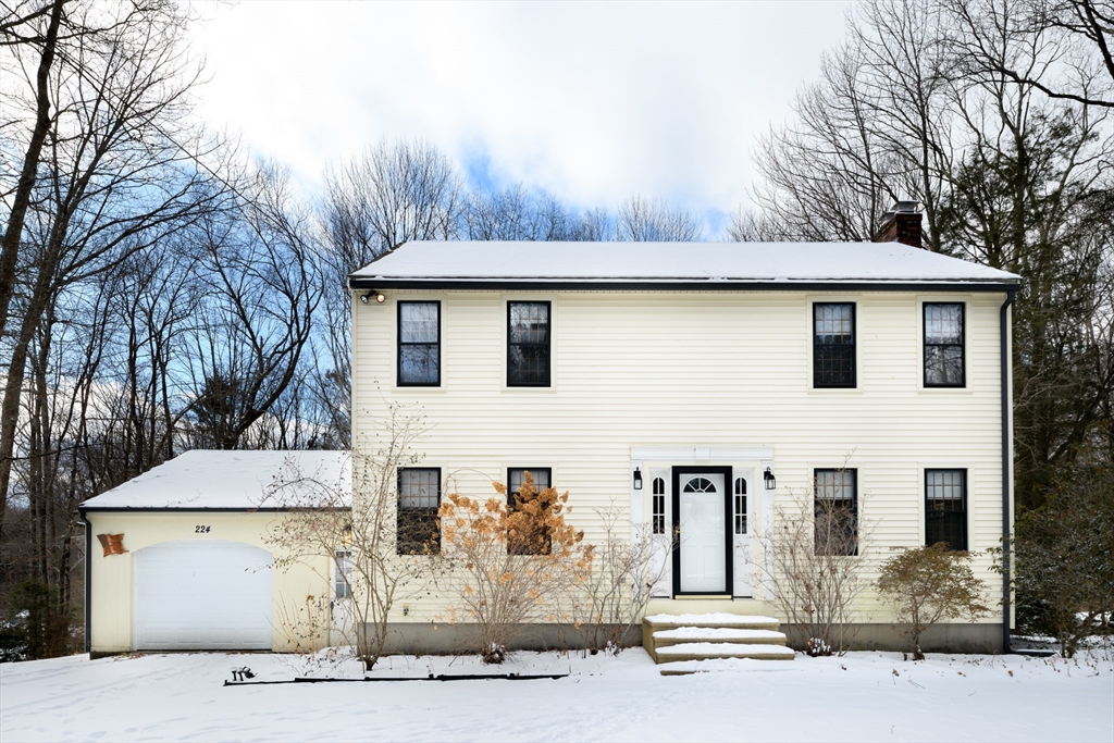 224 Podunk Road Sturbridge, MA 01566 - Photo 1 of 26 a front view of a house with garage