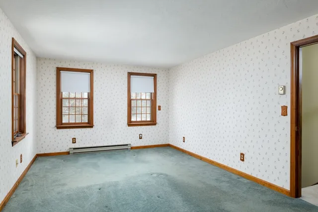 an empty room with windows